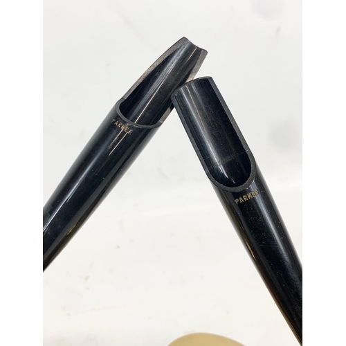 112 - A pair of Parker Pen stands. Inscribed. 13 x 15cm