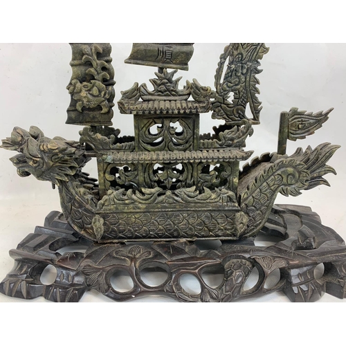 120 - A large early 20th century Chinese carved jade ship on wooden base. Circa 1900. 38 x 36cm.