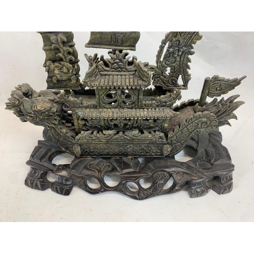 120 - A large early 20th century Chinese carved jade ship on wooden base. Circa 1900. 38 x 36cm.