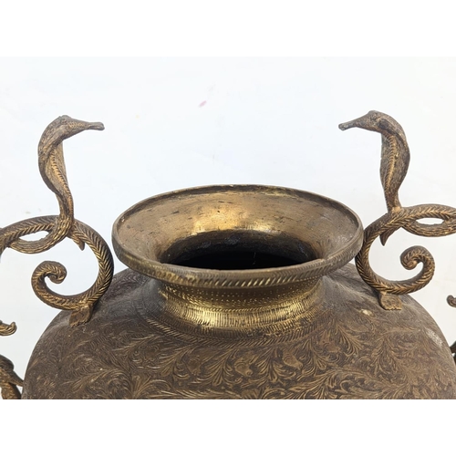 121 - A large ornate late 19th century brass urn, Burmese / Indian. Circa 1880-90s. 35x57.5cm