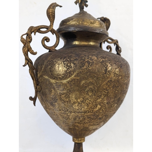 121 - A large ornate late 19th century brass urn, Burmese / Indian. Circa 1880-90s. 35x57.5cm