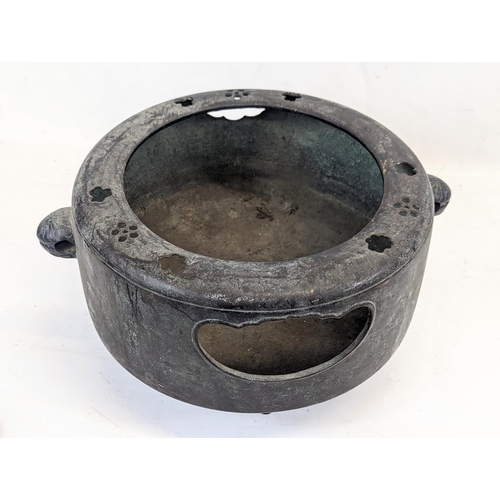 122 - A large early 19th century Burmese bronze incense pot. 36x18cm