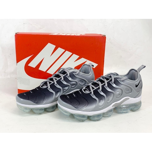 159 - A pair of Nike Air Vapormax Plus shoes in box. UK 9.5