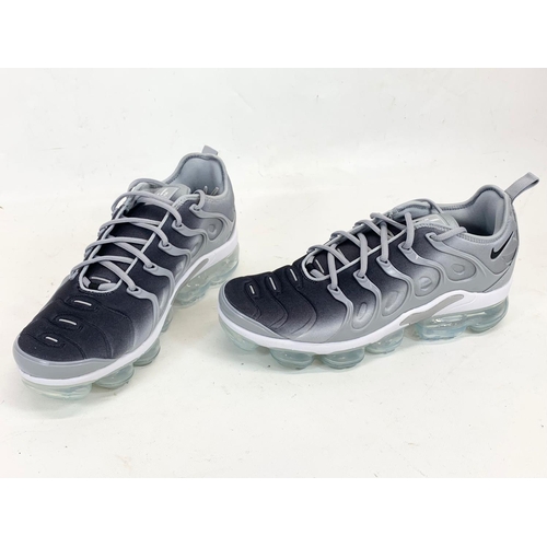 159 - A pair of Nike Air Vapormax Plus shoes in box. UK 9.5