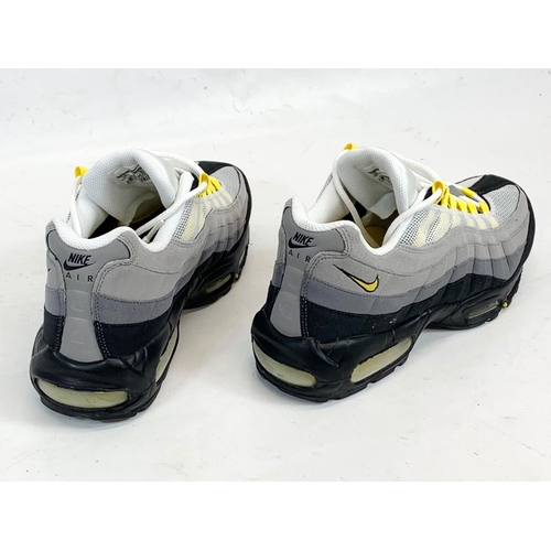 165 - A pair of Nike Air Max shoes. UK 9