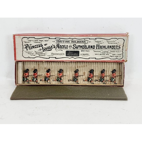 17 - An early 20th century Britains “British Soldiers” led models in original box. Manufactured by Willia... 