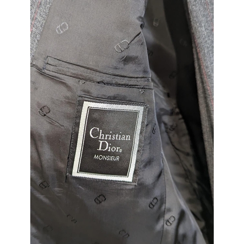 184 - A 2 piece Christian Dior suit, including blazer / jacket and trousers. Blazer is 38 Regular