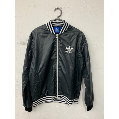 194 - An Adidas jacket. Medium