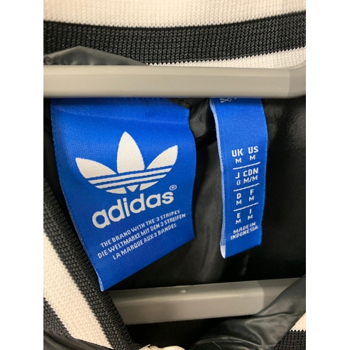 194 - An Adidas jacket. Medium