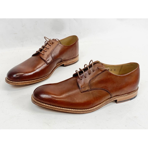 208 - A pair of Grenson leather dress shoes. UK 9