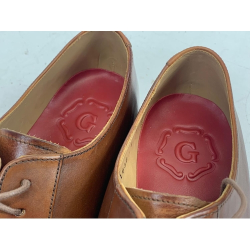 208 - A pair of Grenson leather dress shoes. UK 9