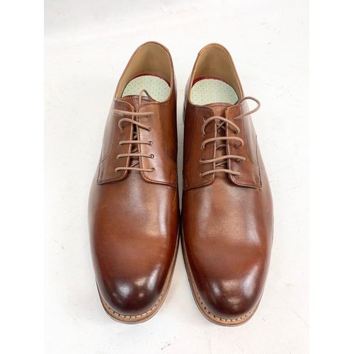 208 - A pair of Grenson leather dress shoes. UK 9