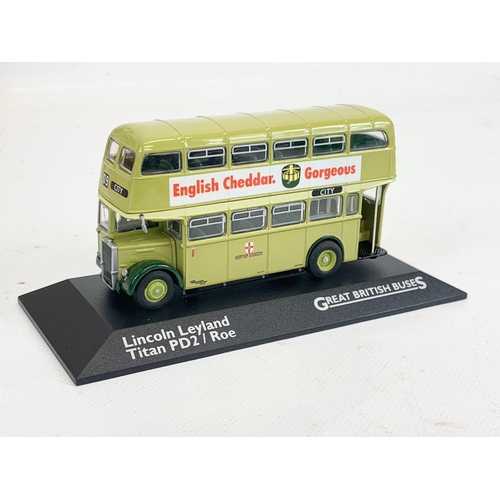 21 - A collection of 10 model buses in boxes, by Great British Buses.