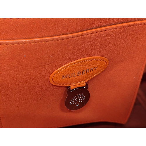 210 - A Mulberry classic bayswater handbag in tangerine orange. 40x7x42cm