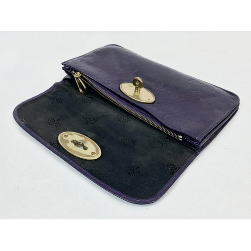 221 - A vintage Mulberry long locked buffalo leather wallet.