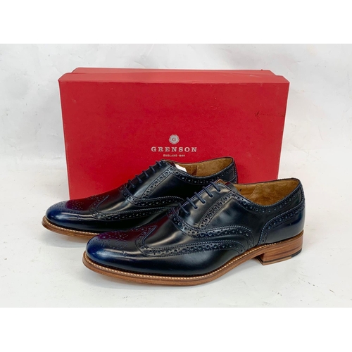 223 - A pair of Grenson leather dress shoes, in box. UK 9