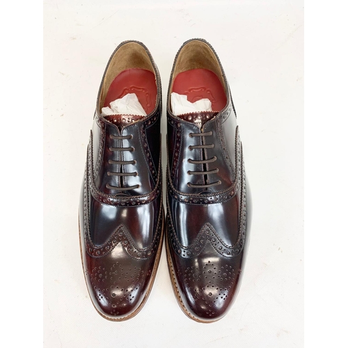 225 - A pair of Grenson leather dress shoes. UK 9.