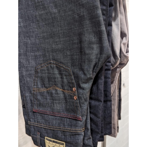 237 - A quantity of men's jeans and corduroys, including River Island, Jasper Conran, etc.