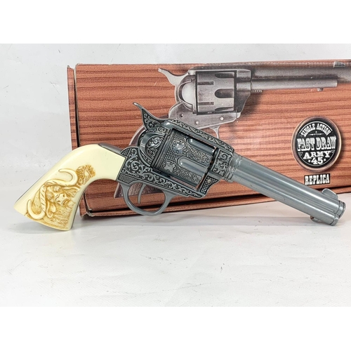 24 - A Kolser replica pistol with 2 boxes, a Gohner replica pistol and a Buckeroo childs toy pistol.