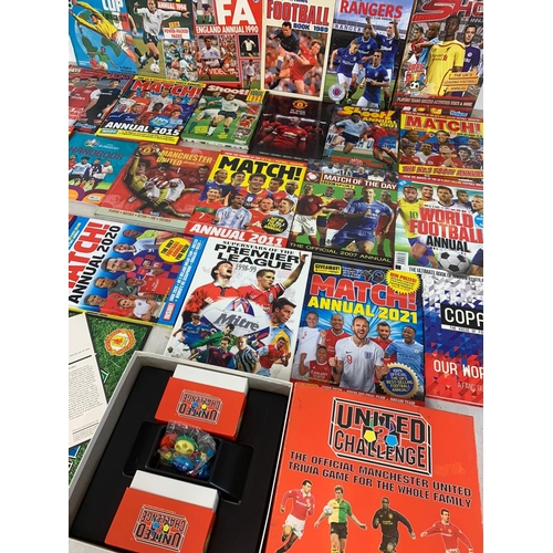 251B - A collection of football annuals, and a Manchester United United Challenge game