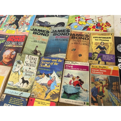 251E - A good collection of vintage books and annuals. Including James Bond and more, with children’s books... 