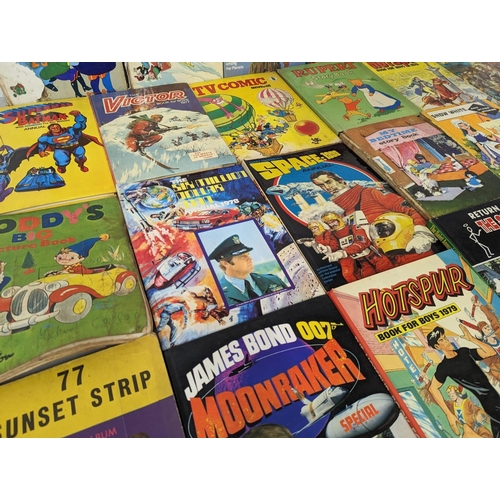 251E - A good collection of vintage books and annuals. Including James Bond and more, with children’s books... 