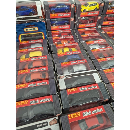 251F - A large collection of Tesco Mini Series model cars in boxes.