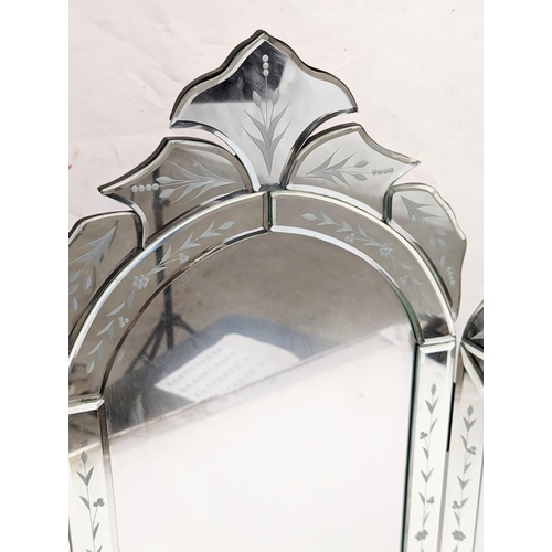 267 - A Venetian style dressing mirror. 63.5x60cm