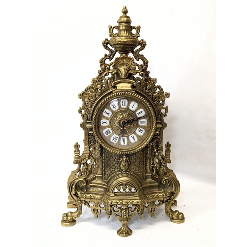 269 - An ornate brass 18th century French style mantle clock. 41.5cm