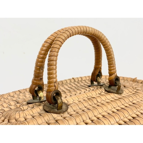 27 - A 1930’s wicker sewing basket. 32cm