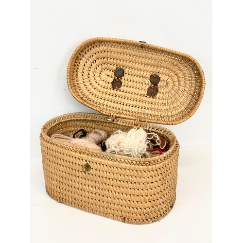 27 - A 1930’s wicker sewing basket. 32cm