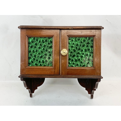 271 - A late Victorian mahogany wall cabinet. 33 x 17 x 33cm.