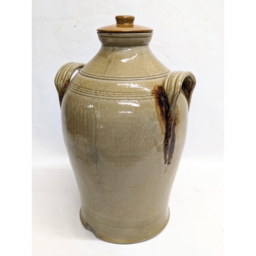 276 - A large early 20th century stone dispenser. 30x49cm