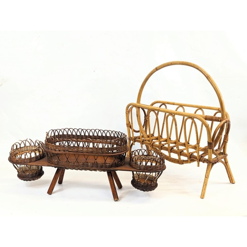 285 - A 1960s bamboo magazine rack with a wicker planter. 47.5x22x50.5cm