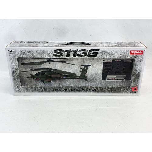 305 - A Syma S113G remote control helicopter in box. Gyro. Box measures 61cm