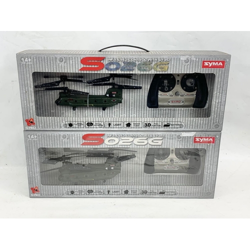 307 - 2 Syma remote control helicopters in boxes. Infrared Comtrol With Gyro. So26G. 48cm.