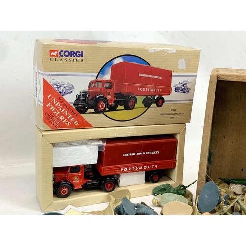 309 - A quantity of model soldiers and a Corgi Classics model truck. Models include Britains, Timpo Toys.