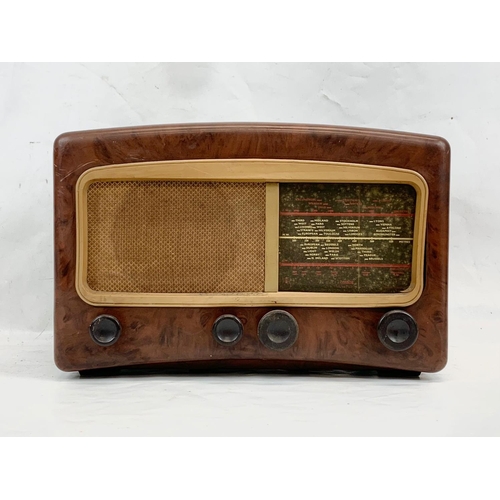 311 - A vintage Bakelite radio, by Cossor. Melody Maker. Model 501AC. 42 x 19.5 x 28cm