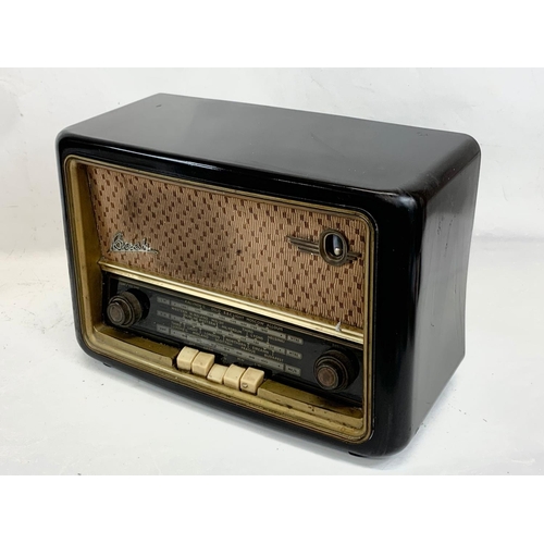 312 - A vintage Bakelite radio, by Bush. VHF61. 41 x 19 x 29cm