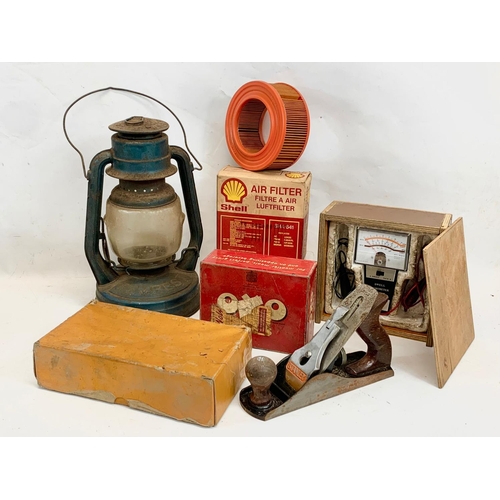 313 - A sundry lot. Including a Tempest Hurricane lamp 34cm, a Stanley planer, a Dwell Tachometer Tester, ... 