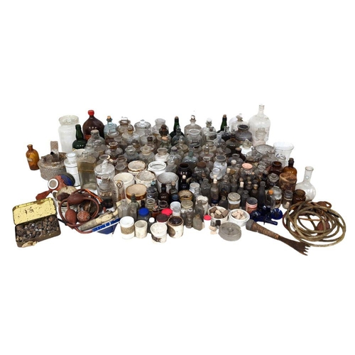 321 - A large quantity of early 20th century chemist bottles etc. Mostly damaged.