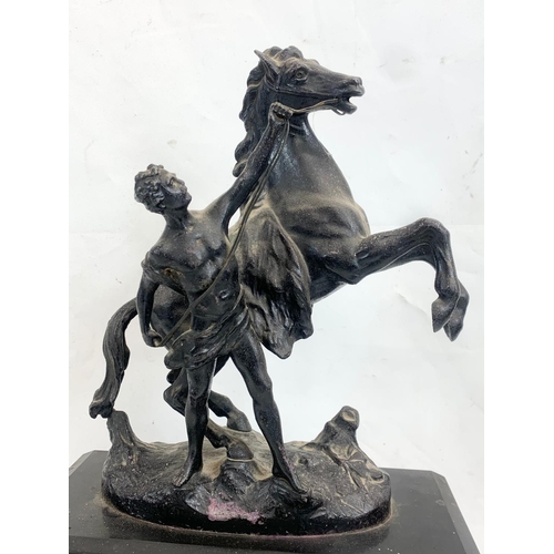 327 - A large Victorian slate mantle clock with spelter horse. 31 x 14.5 x 52cm.