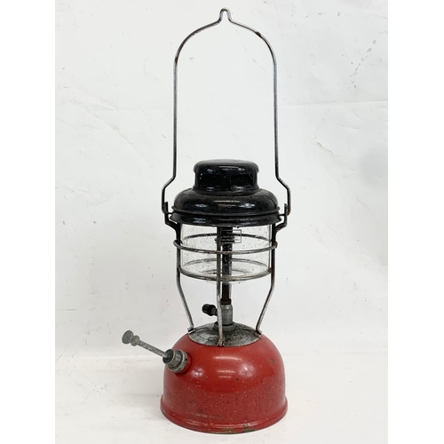 328 - A vintage Tilly lamp. 33cm