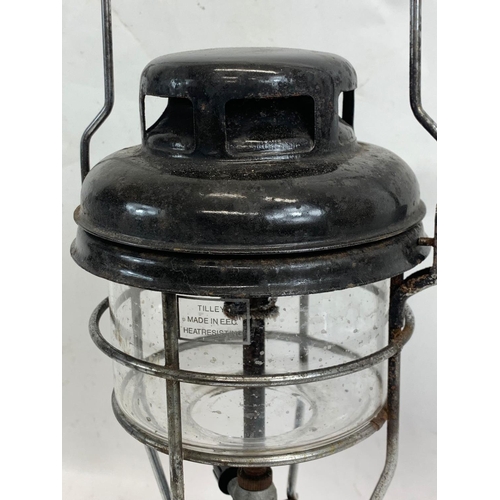 328 - A vintage Tilly lamp. 33cm