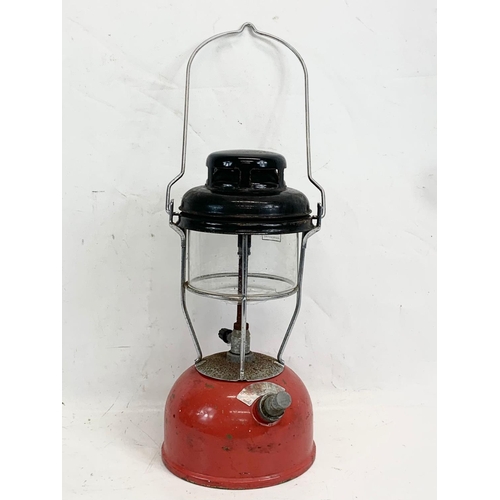 329 - A vintage Tilly lamp. 33cm