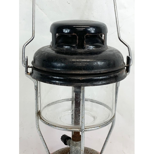 329 - A vintage Tilly lamp. 33cm