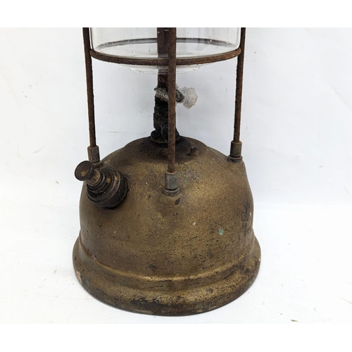 332 - A vintage Tilly lamp. 34cm