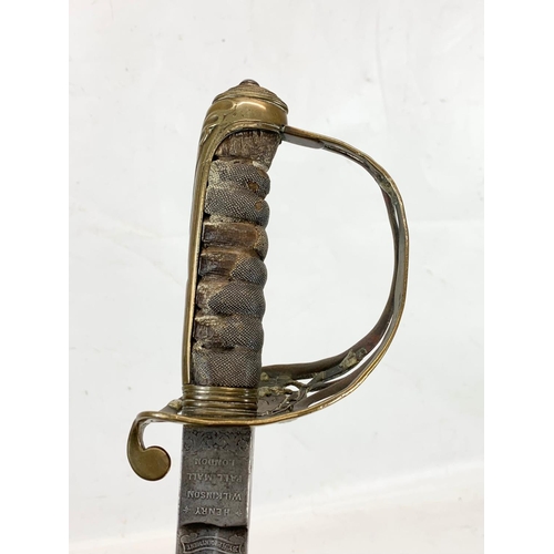 40 - A Victorian military officers sword, with officers initials “MH”. Stamped Henry Wilkinson Pall Mall ... 