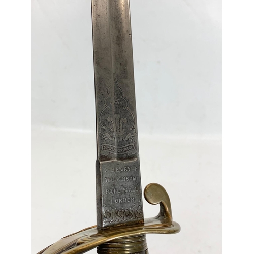 40 - A Victorian military officers sword, with officers initials “MH”. Stamped Henry Wilkinson Pall Mall ... 