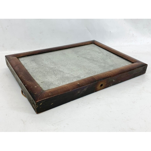 43 - A small Victorian mahogany framed dressing mirror. 38 x 28cm.